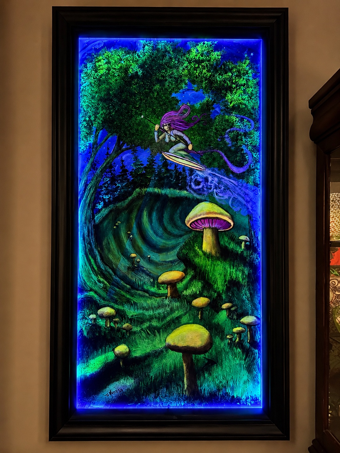 Tall handcrafted frame with glowing fantasy forest artwork